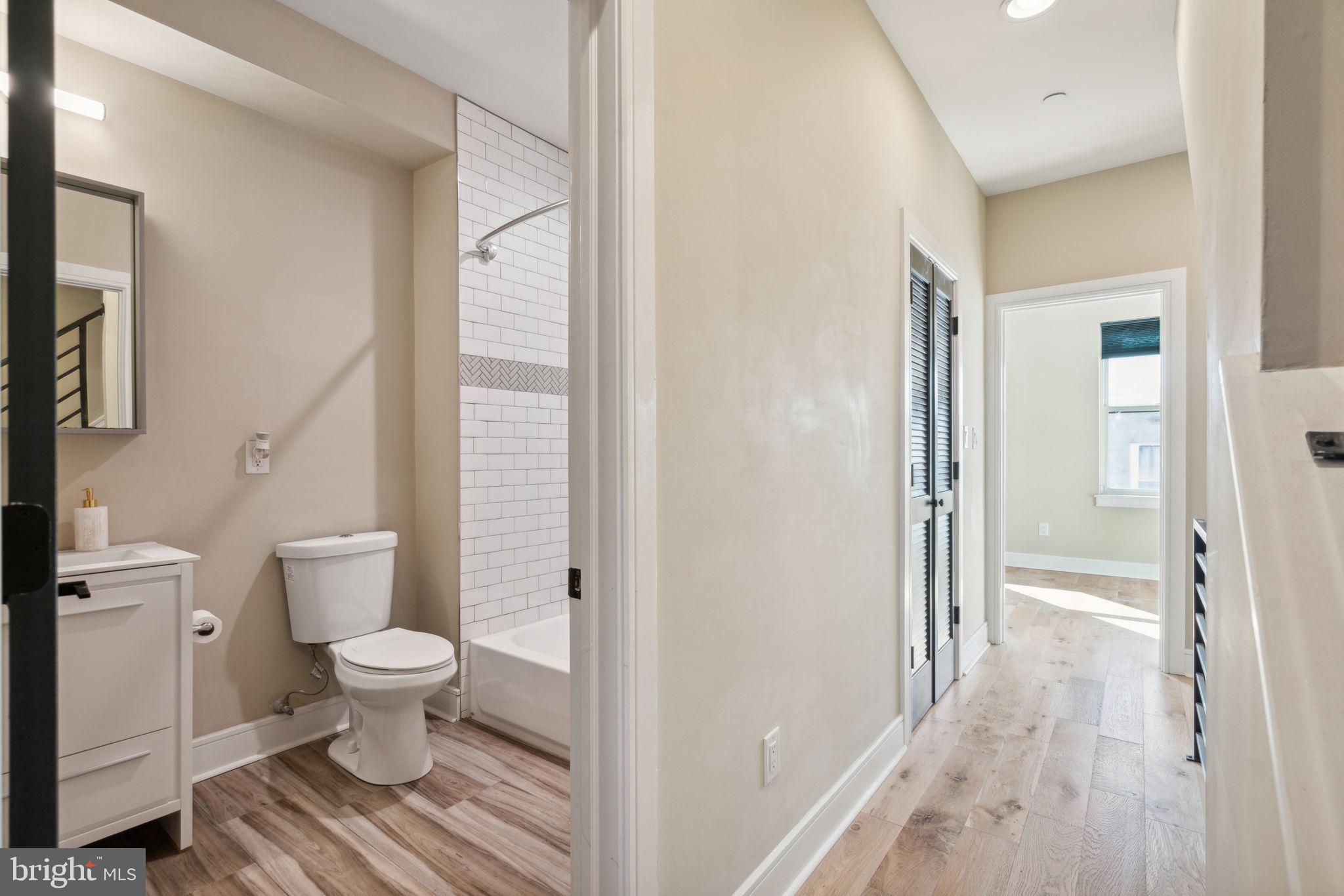 518 Mercy Street Philadelphia, PA 19148 - Photo 34 of 50 Modern hallway with stylish bath.