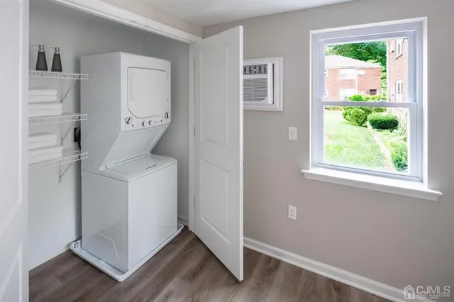 a utility room with closet dryer and washer