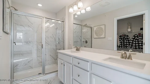 a bedroom with furniture and windows