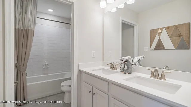 a bed room with furniture and a window