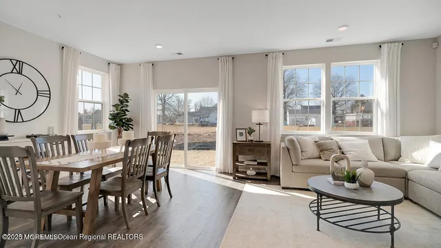a view of a livingroom with furniture and window