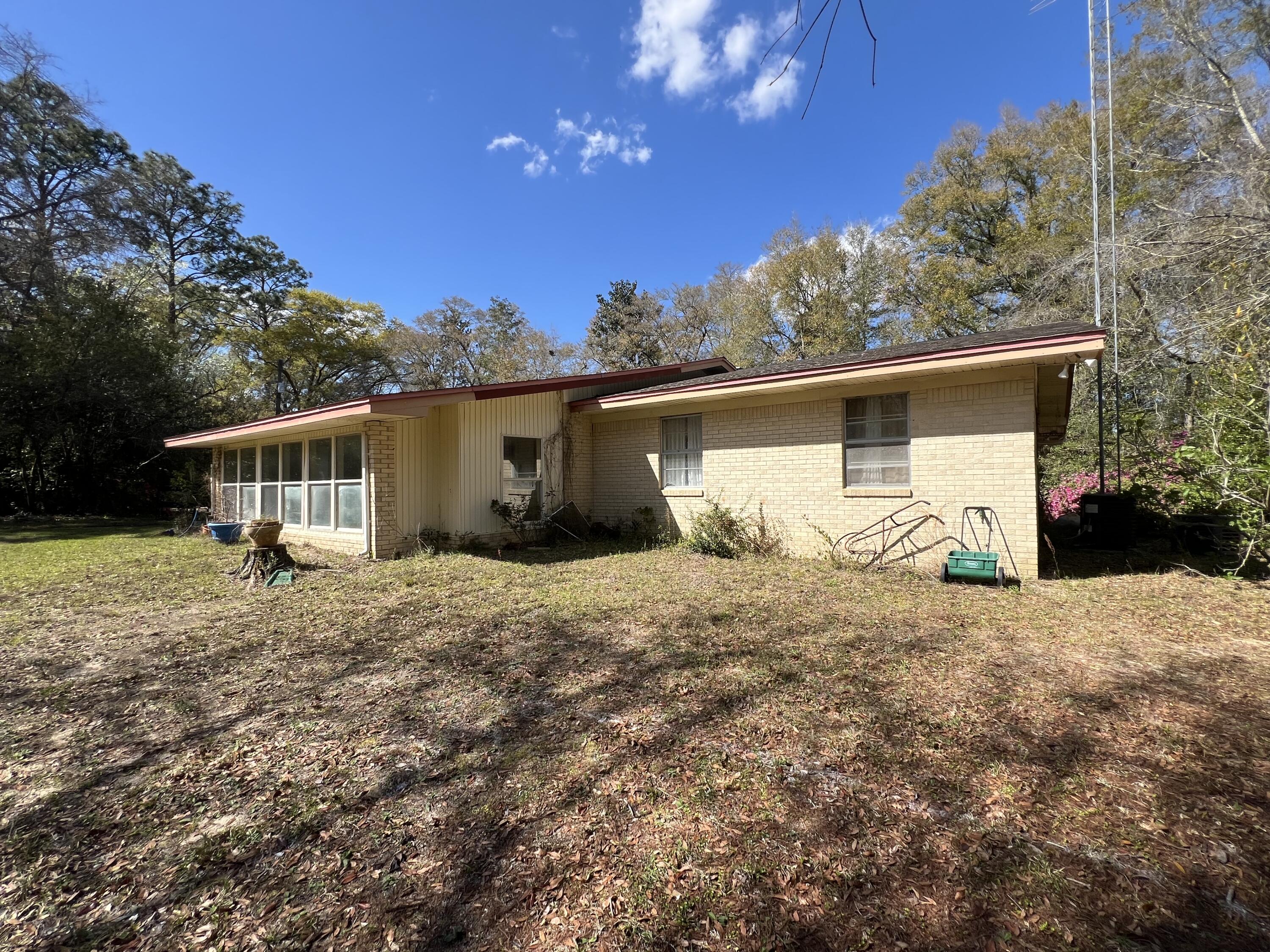 3211 Maple Street Crestview, FL 32539 - Photo 20 of 41 a house view with a backyard space