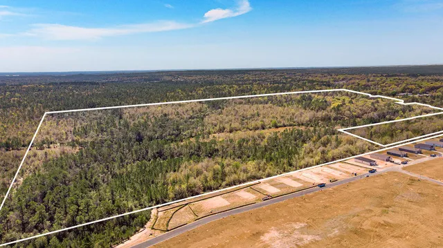 a view of balcony with wooden floor