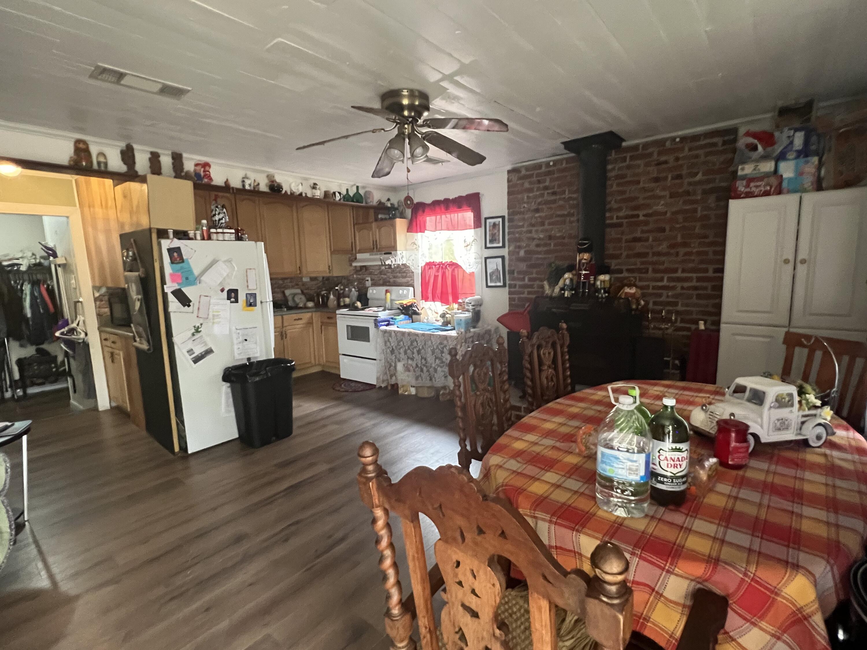 3211 Maple Street Crestview, FL 32539 - Photo 25 of 41 a living room with furniture and flat screen tv