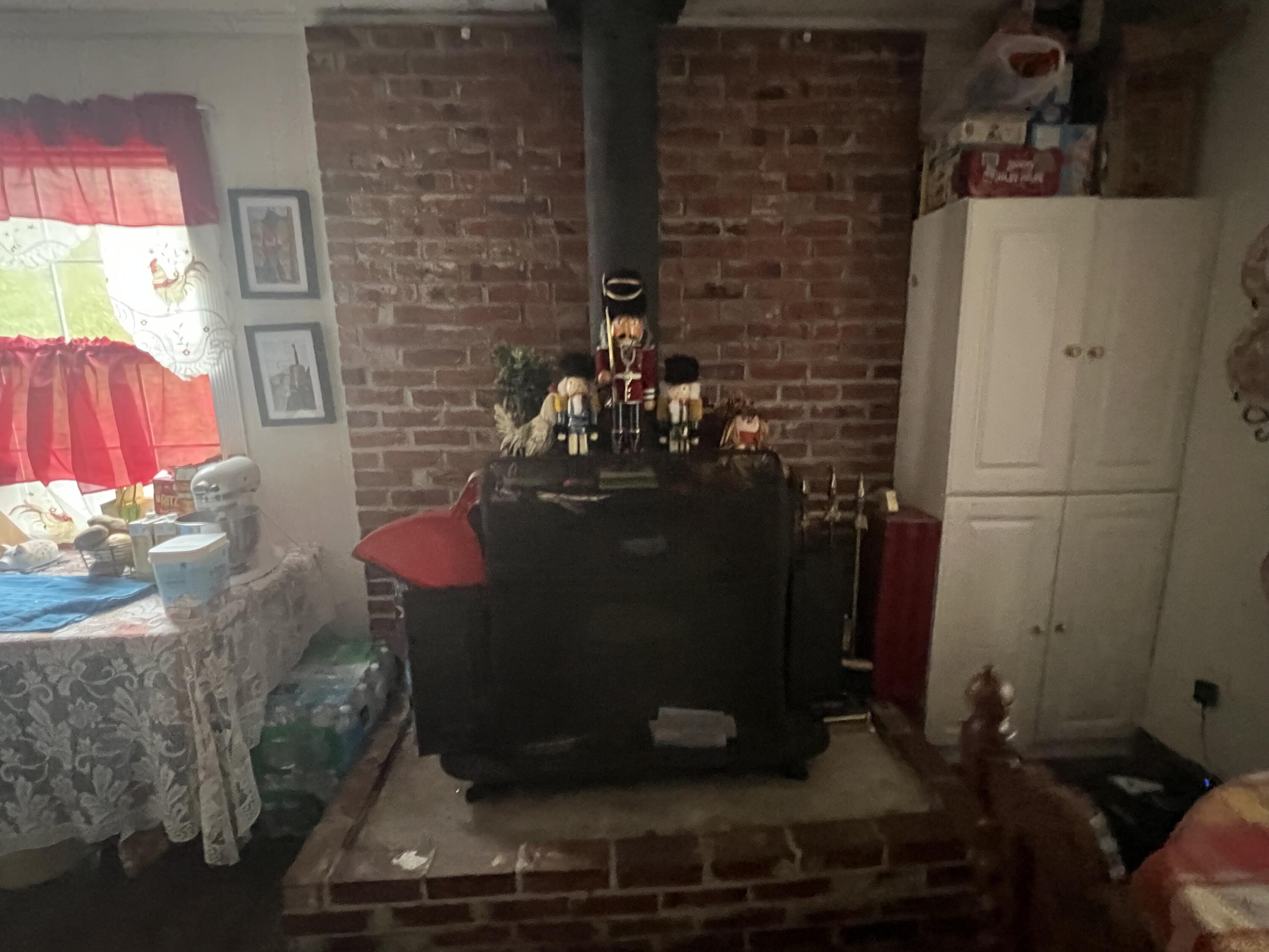 3211 Maple Street Crestview, FL 32539 - Photo 29 of 41 a room with a fireplace