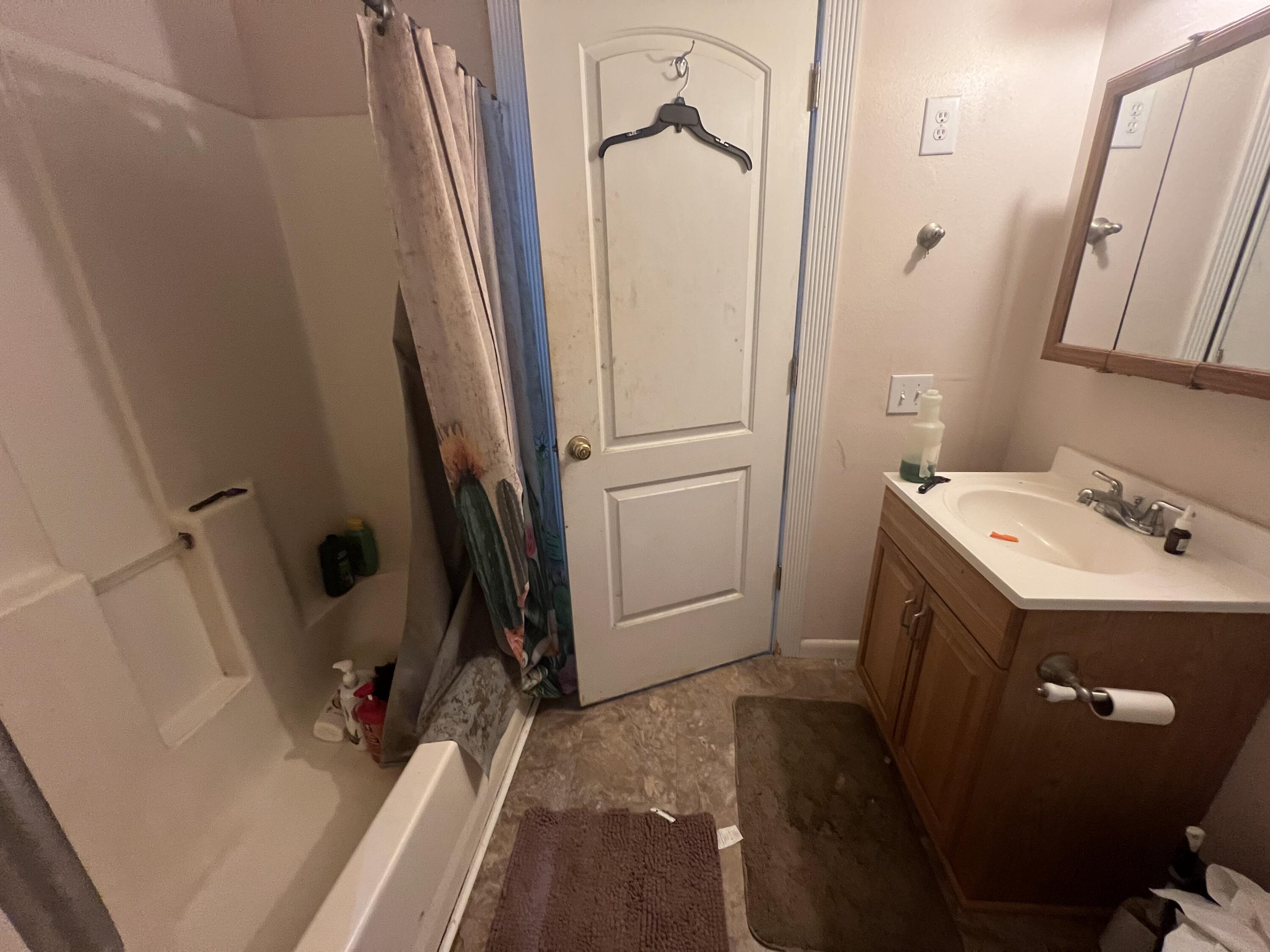 3211 Maple Street Crestview, FL 32539 - Photo 35 of 41 a view of storage and utility room with a sink