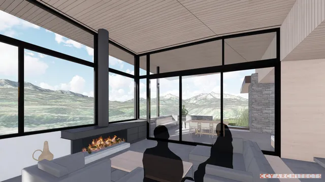 a living room with large windows and furniture