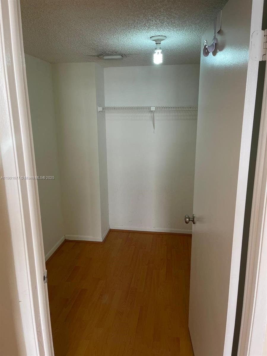 8251 Northwest 8th Street, Unit 414 Miami, FL 33126 - Photo 13 of 25 a view of empty room