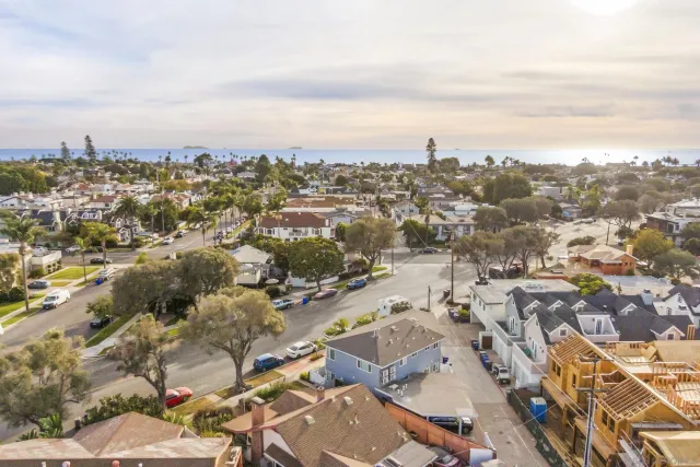 an aerial view of a city with lots of residential buildings