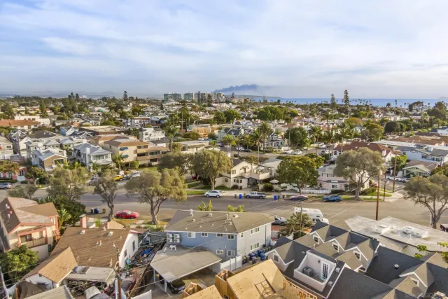 an aerial view of a city with lots of residential buildings