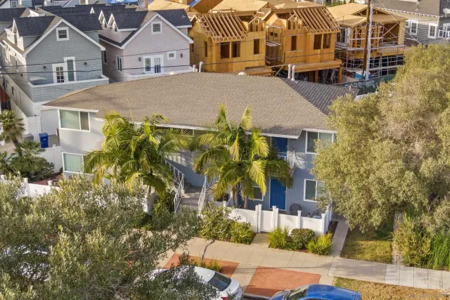 an aerial view of a city with lots of residential buildings