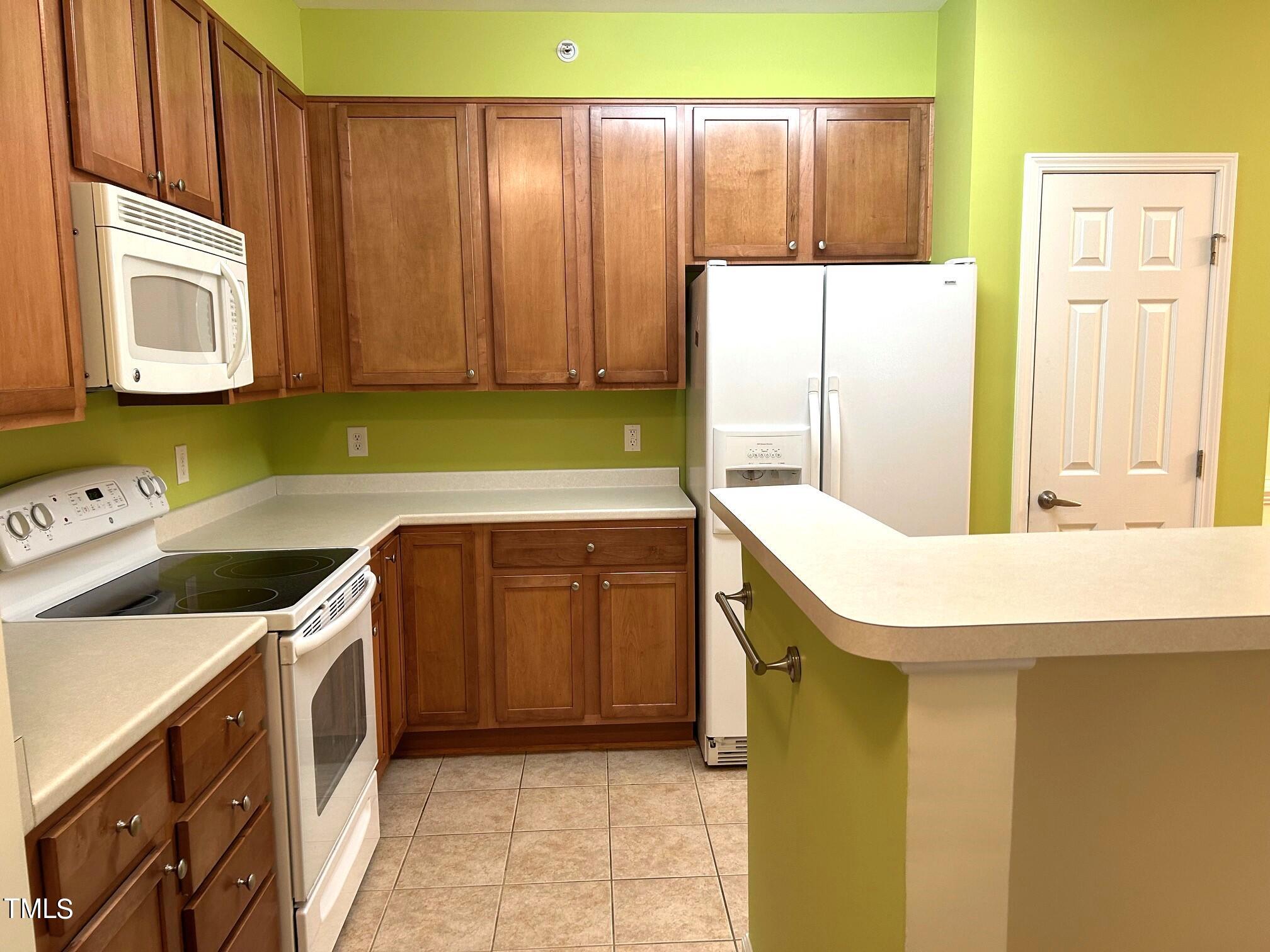 512 Weather Ridge Lane, Unit 2 Cary, NC 27513 - Photo 9 of 22 Weather Ridge kitchen EIMG_5035