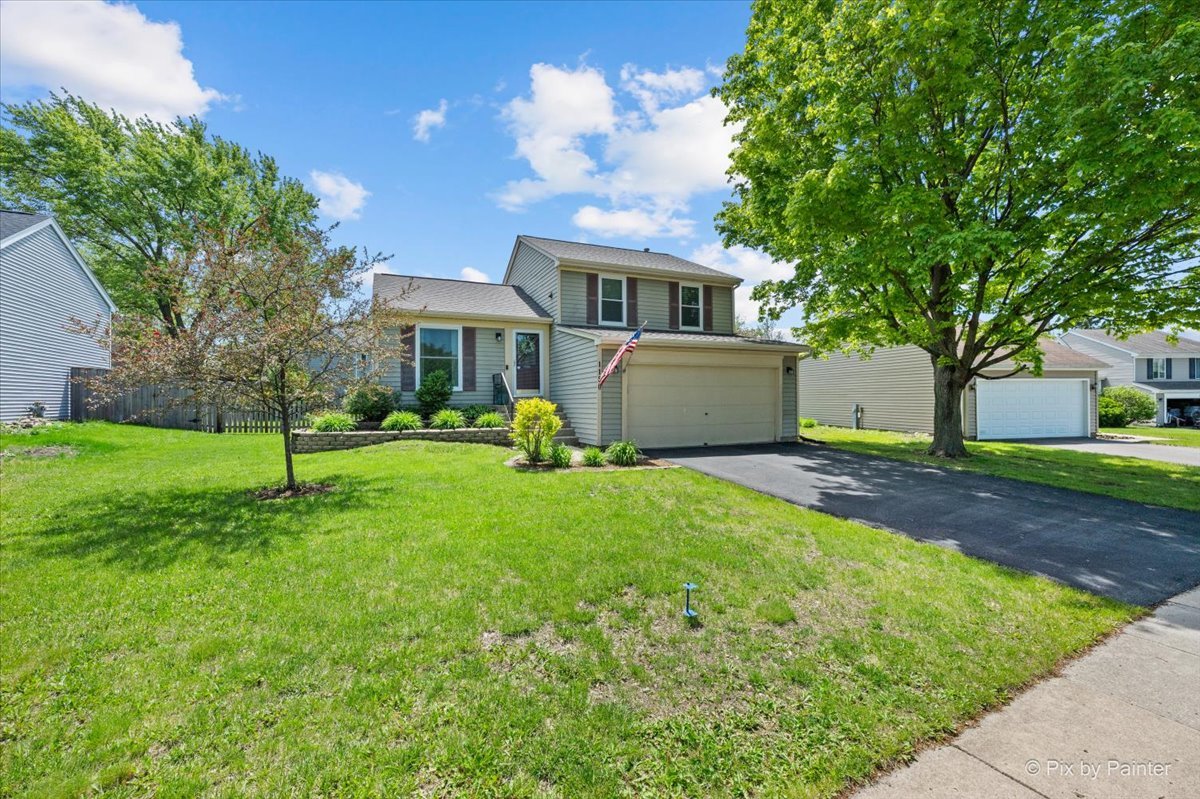 1150 Appleton Lane Geneva, IL 60134 - Photo 36 of 43 a front view of a house with a yard