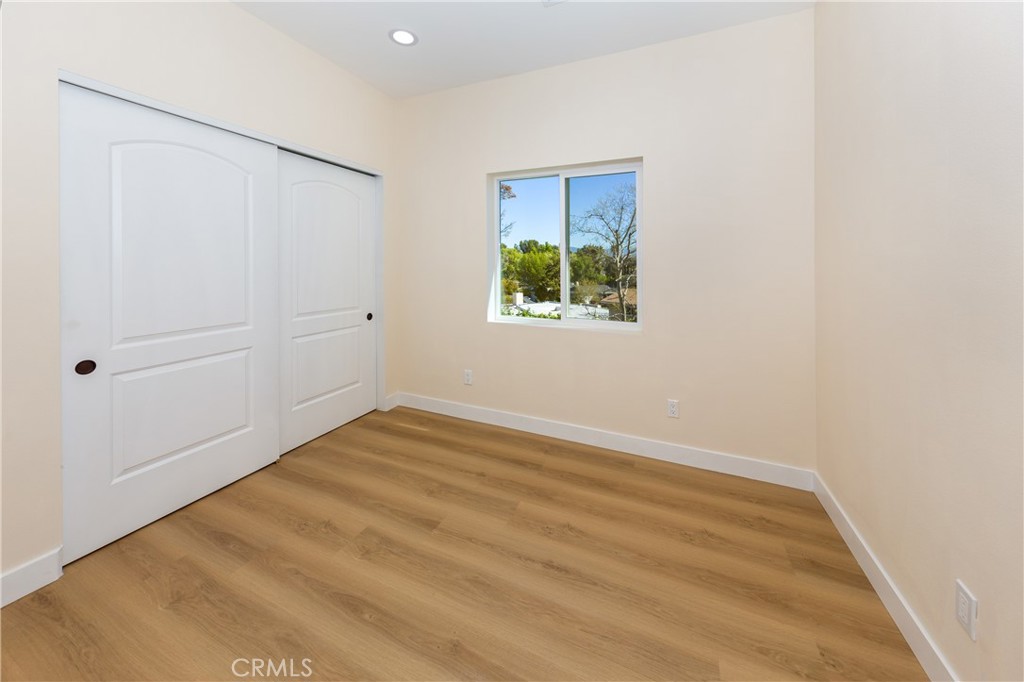 26210 Larkhaven Place Newhall, CA 91321 - Photo 18 of 29 an empty room with a window