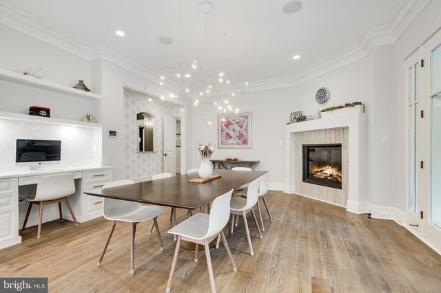 a room with furniture and a book shelf