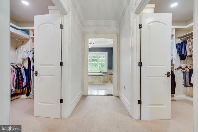 a view of a house with a yard porch and sitting area