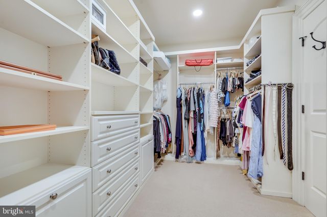 a view of a backyard with sitting area