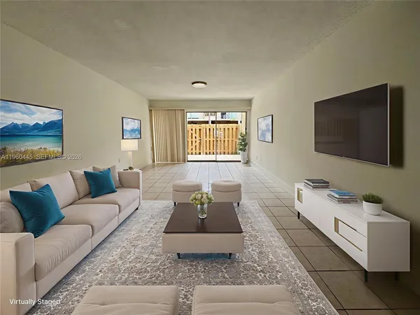 a living room with furniture and a flat screen tv