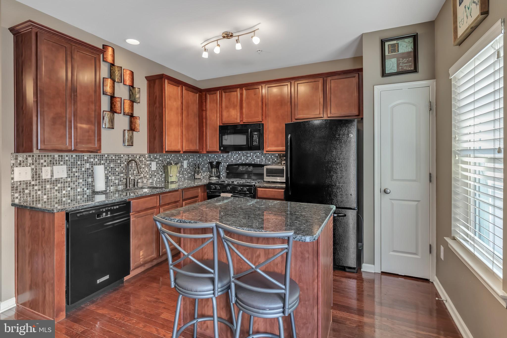 3784 William Daves Road, Unit 15 Doylestown, PA 18902 - Photo 14 of 33 Main Floor Kitchen with Island
