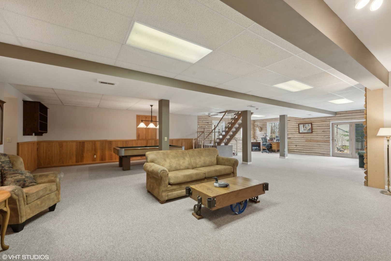 N1519 Fair Oaks Road Lake Geneva, WI 53147 - Photo 11 of 16 a living room with furniture and kitchen view
