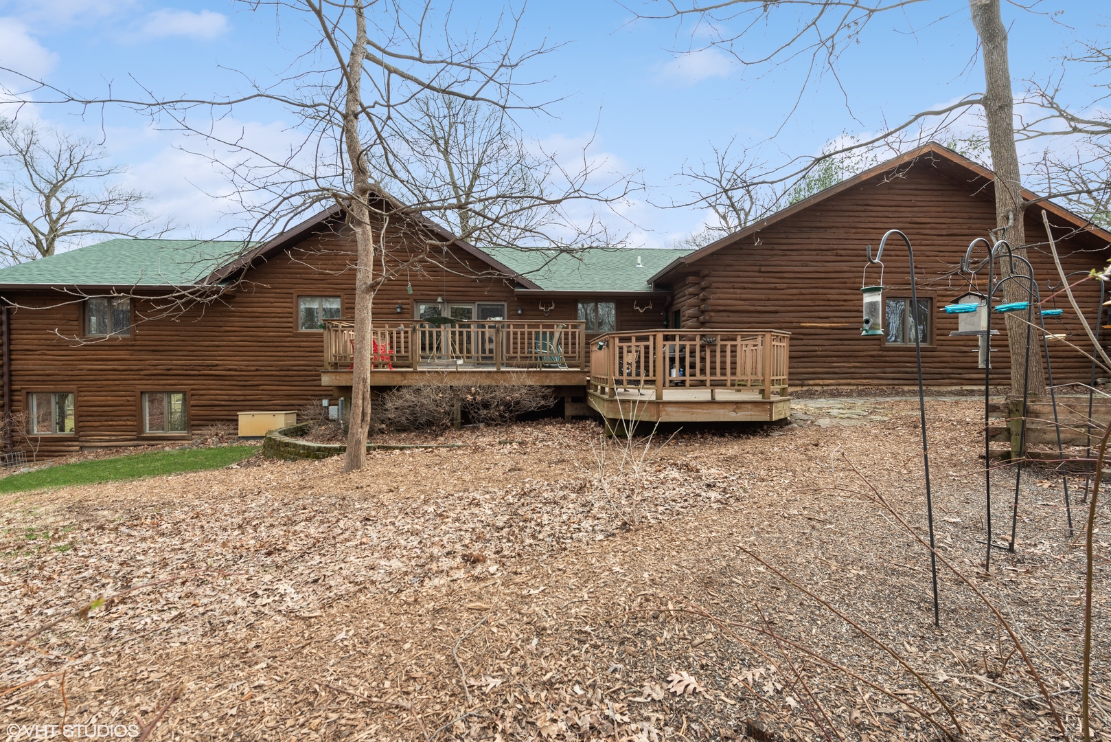 N1519 Fair Oaks Road Lake Geneva, WI 53147 - Photo 13 of 16 a front view of a house with a yard