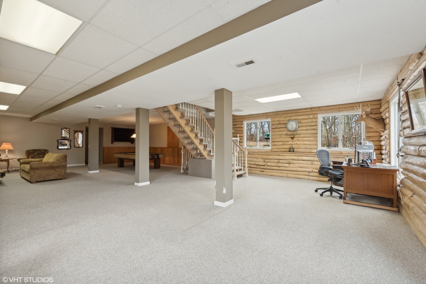 N1519 Fair Oaks Road Lake Geneva, WI 53147 - Photo 9 of 16 a view of a livingroom with furniture and a window