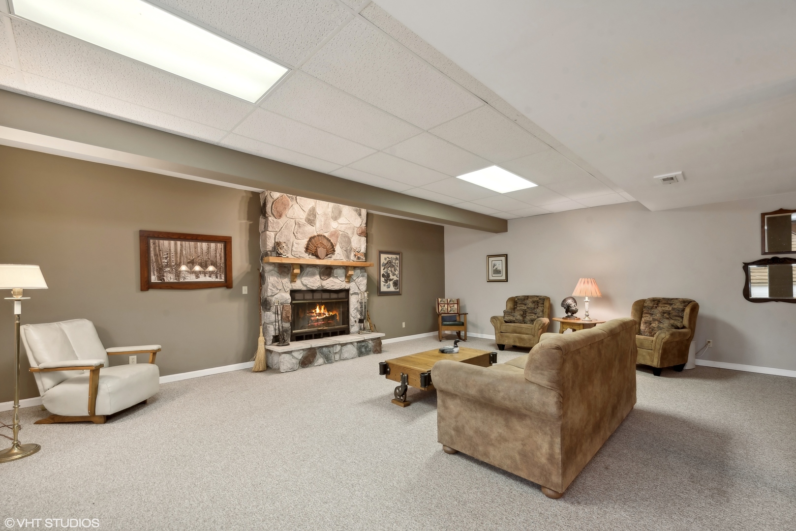 N1519 Fair Oaks Road Lake Geneva, WI 53147 - Photo 10 of 16 a living room with furniture and a flat screen tv