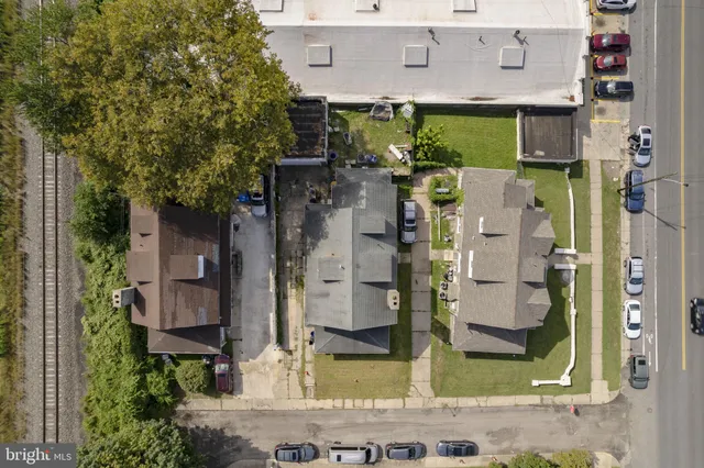 a aerial view of a house with a yard