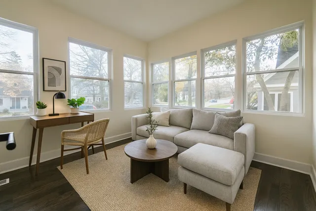 a living room with furniture and a window