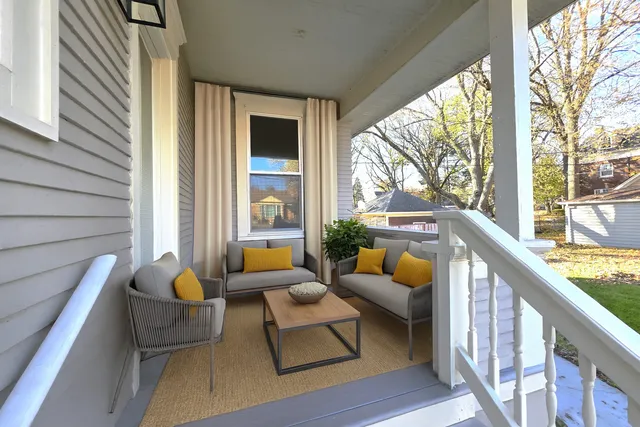 a balcony with furniture and a couch