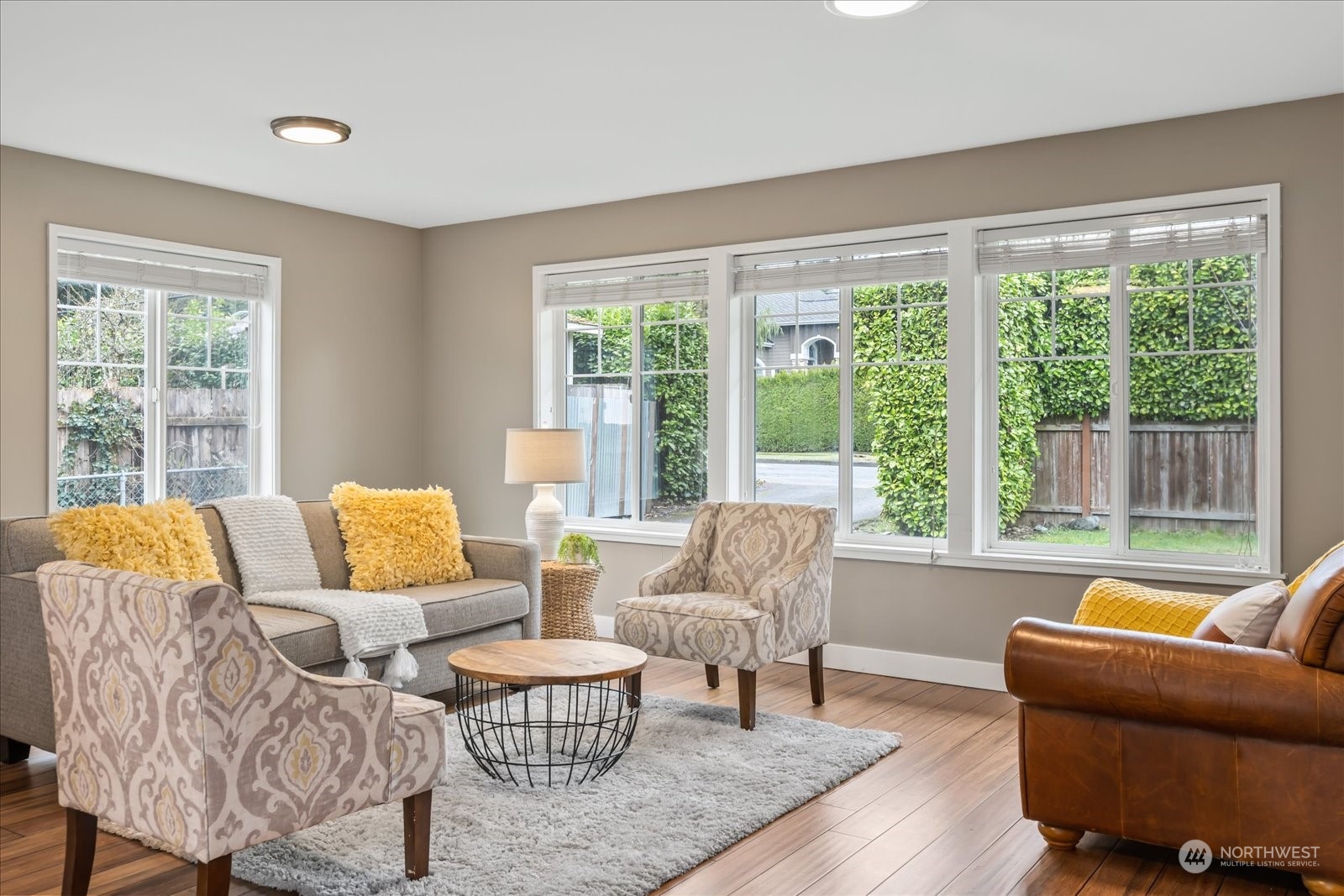 24231 23rd Avenue Southeast Bothell, WA 98021 - Photo 13 of 40 a living room with furniture and a large window