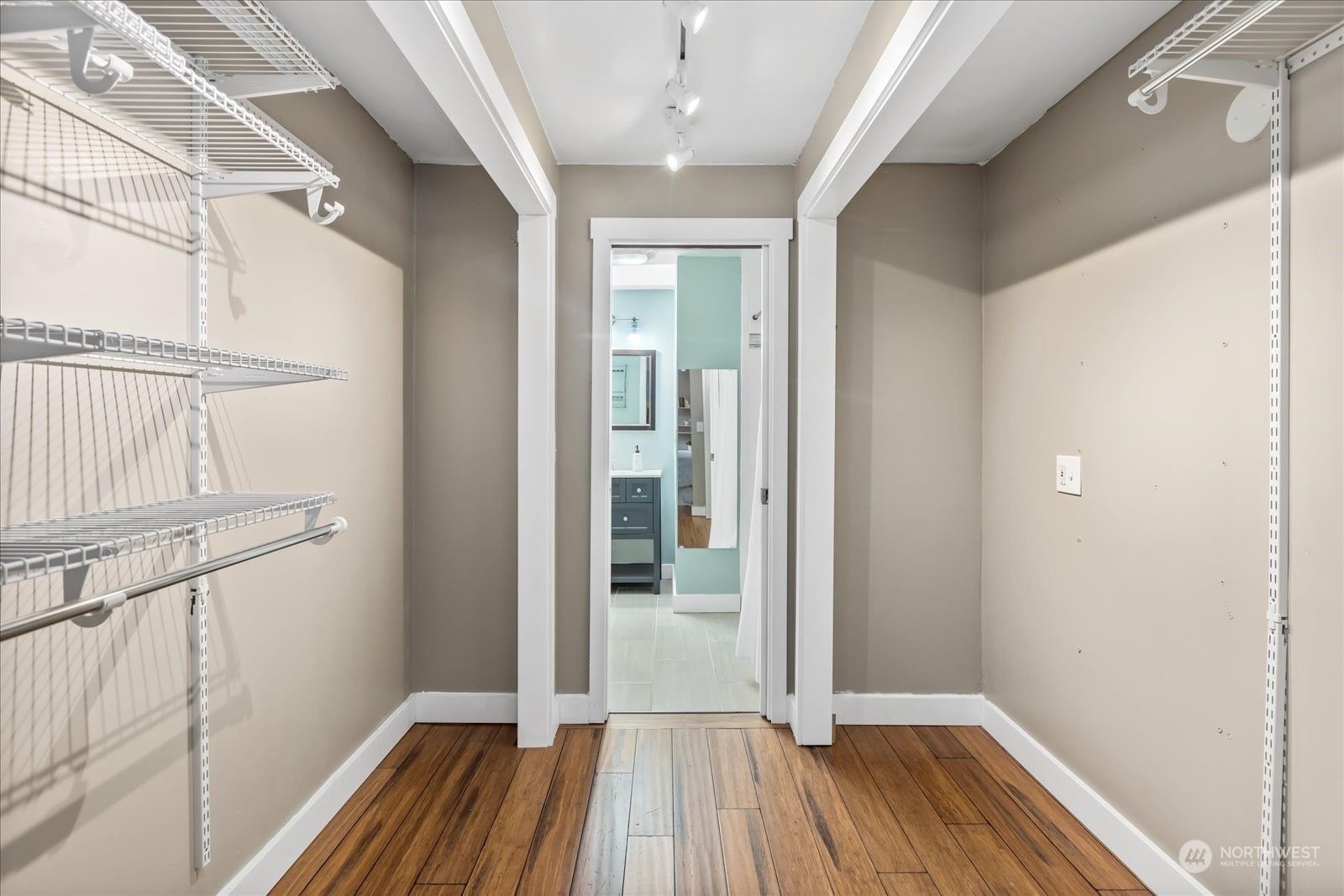 24231 23rd Avenue Southeast Bothell, WA 98021 - Photo 17 of 40 a view of hallway with a large window and wooden floor