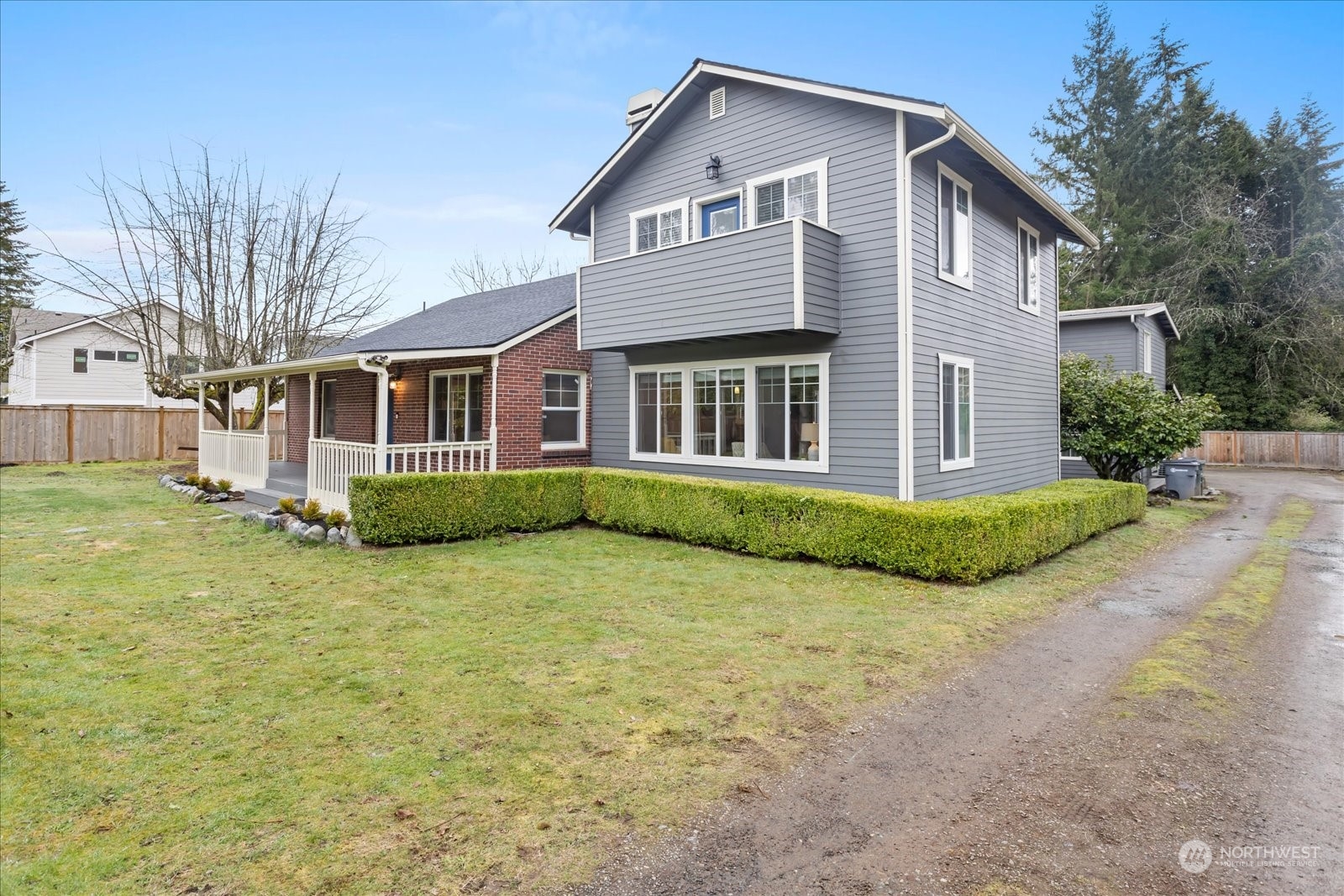 24231 23rd Avenue Southeast Bothell, WA 98021 - Photo 22 of 40 a view of a white house with a big yard and large trees