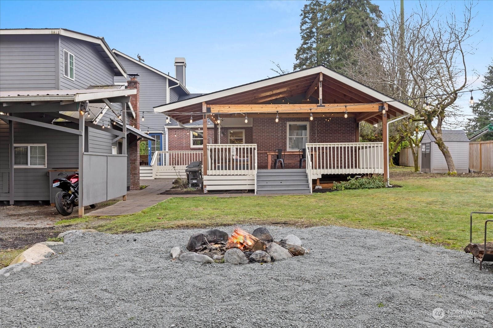 24231 23rd Avenue Southeast Bothell, WA 98021 - Photo 23 of 40 a view of a house with a yard porch and sitting area