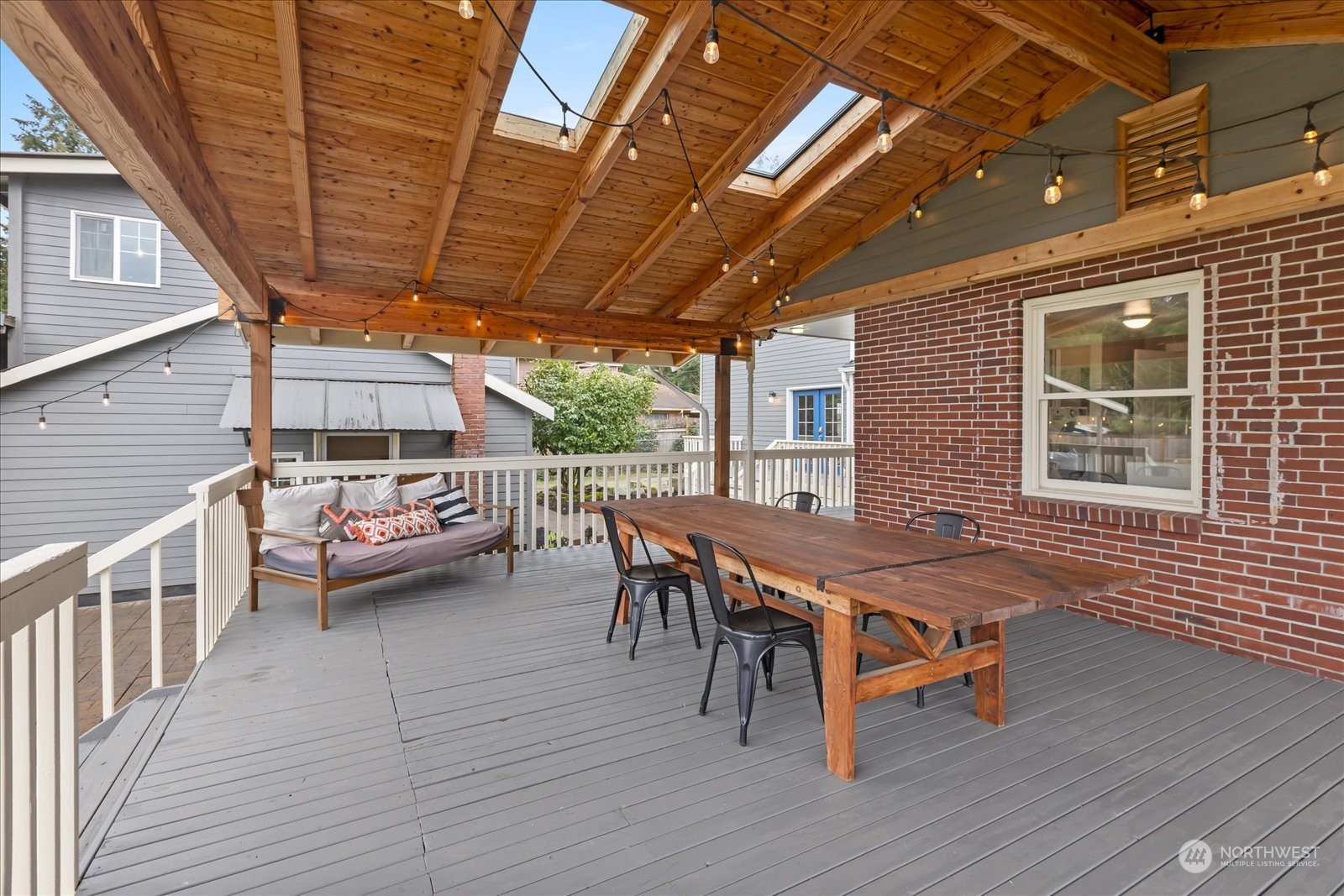 24231 23rd Avenue Southeast Bothell, WA 98021 - Photo 24 of 40 a balcony with furniture and wooden floor
