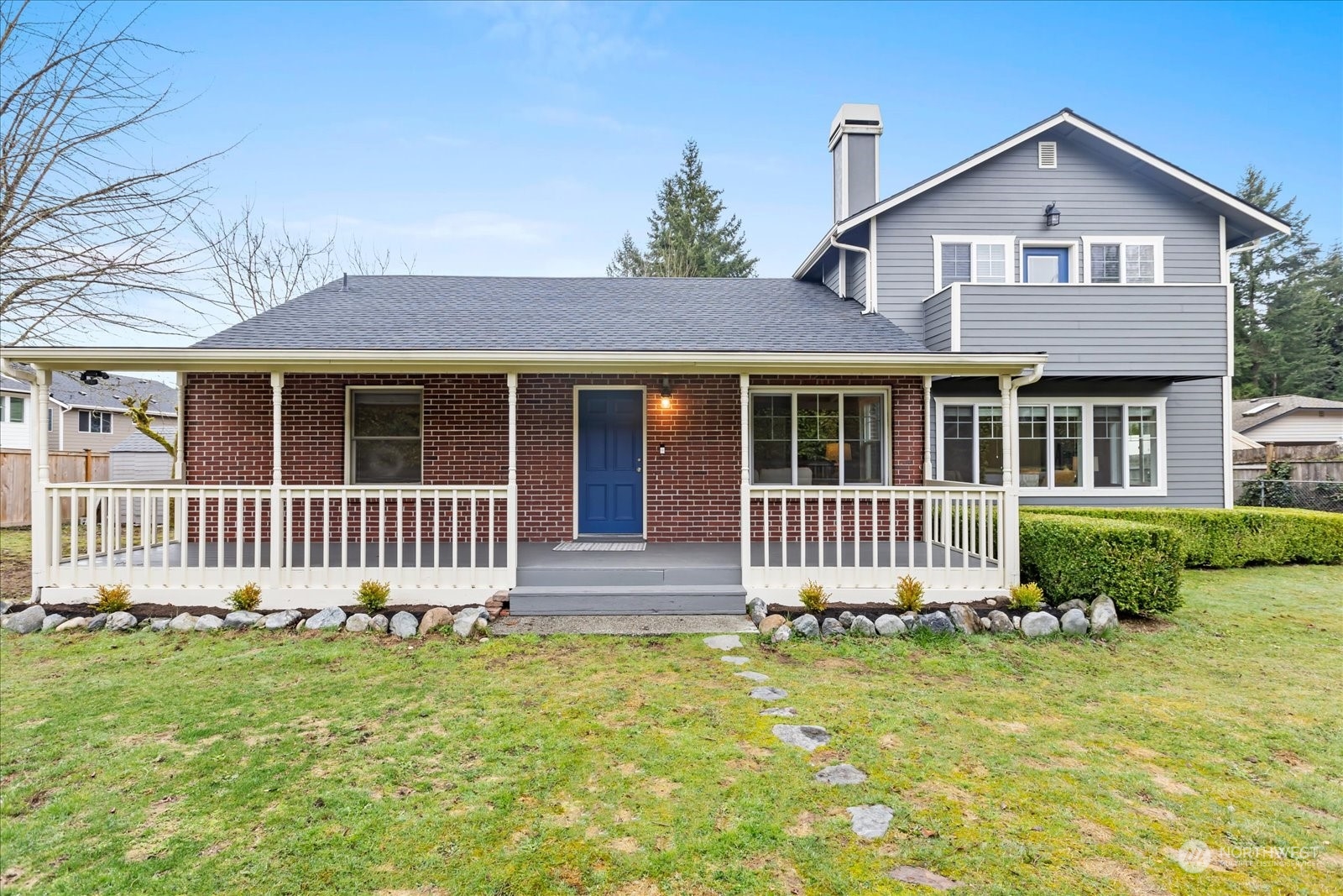 24231 23rd Avenue Southeast Bothell, WA 98021 - Photo 3 of 40 a front view of a house with a garden