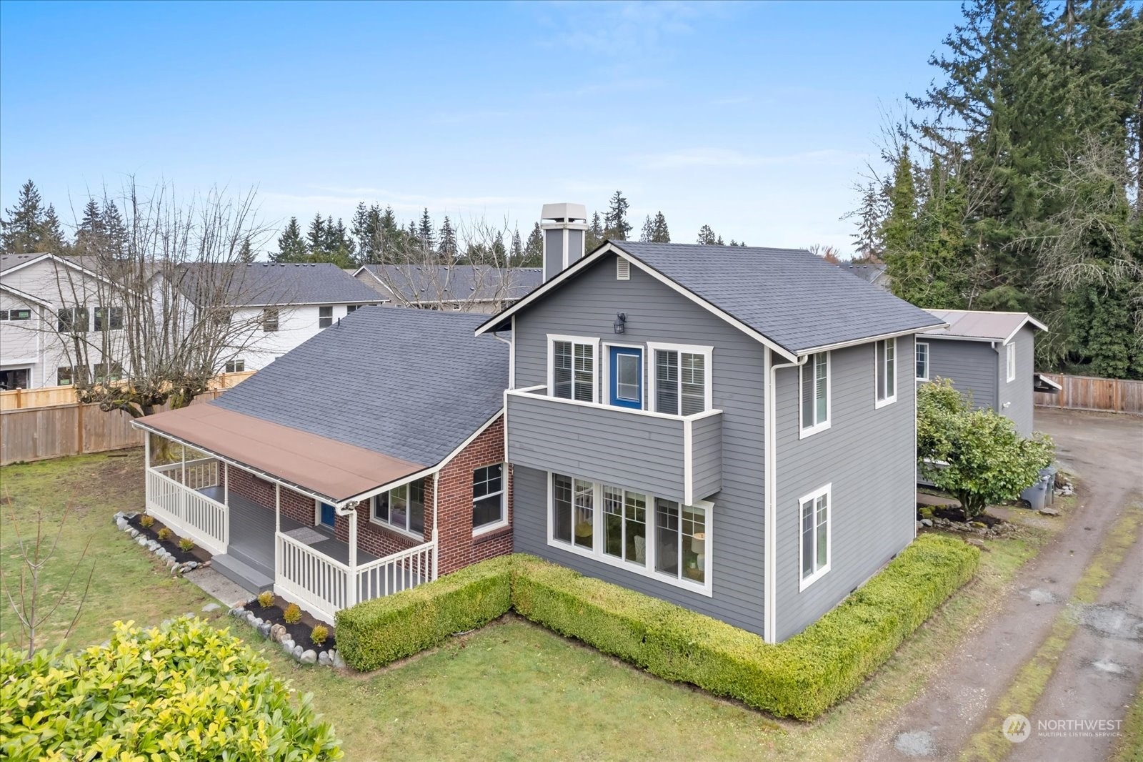24231 23rd Avenue Southeast Bothell, WA 98021 - Photo 32 of 40 a aerial view of a house with a yard and potted plants