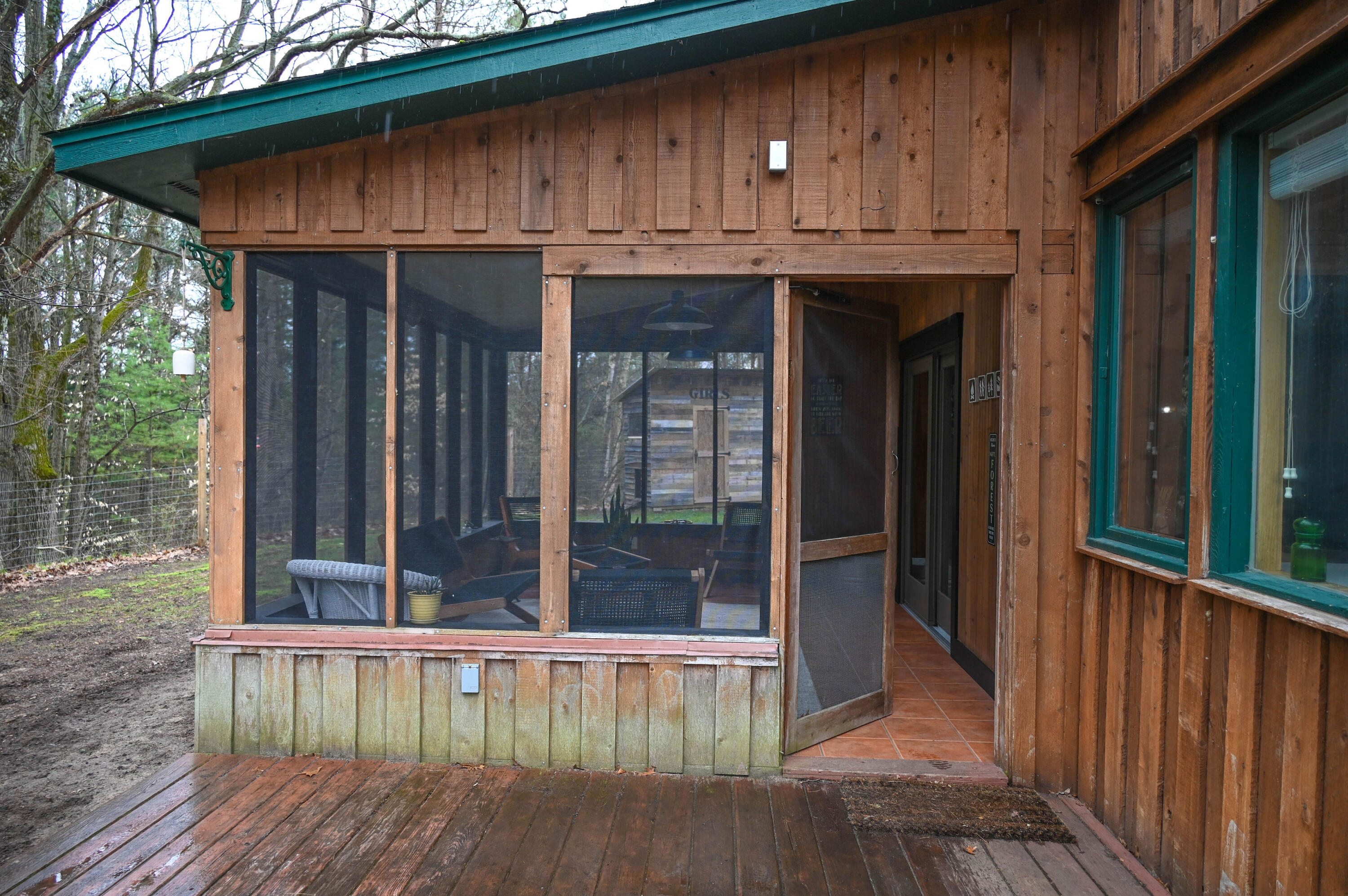 3315 Rose Road Brethren, MI 49619 - Photo 11 of 61 Screened Porch