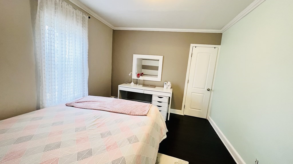 94 Witheridge Street Feeding Hills, MA 01030 - Photo 12 of 24 a bedroom with a bed and a dresser