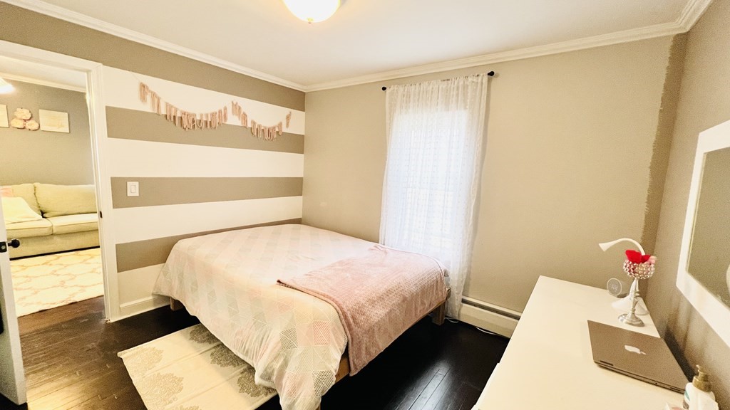 94 Witheridge Street Feeding Hills, MA 01030 - Photo 13 of 24 a bedroom with a bed and a window