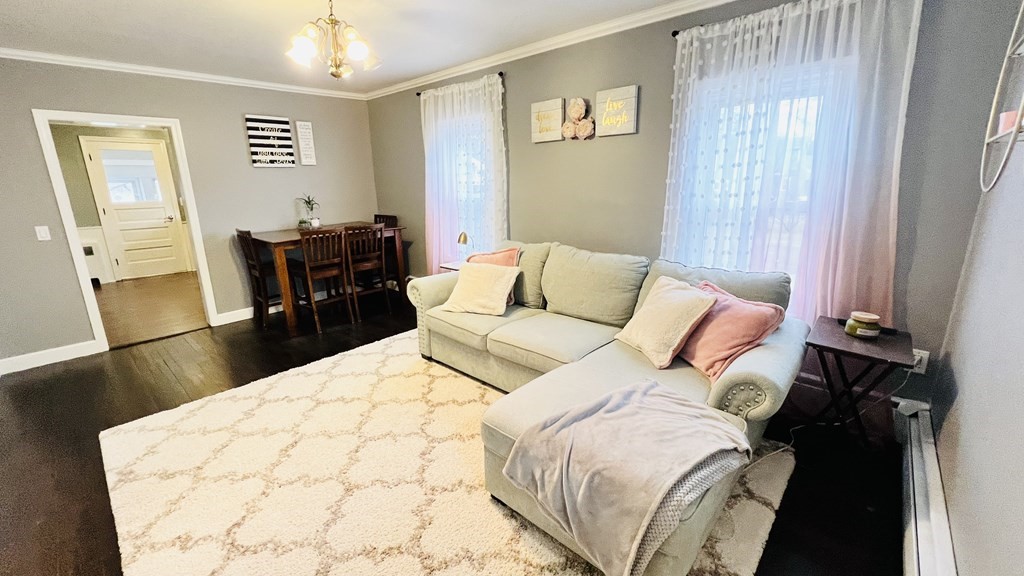 94 Witheridge Street Feeding Hills, MA 01030 - Photo 16 of 24 a bedroom with a bed and wooden floor