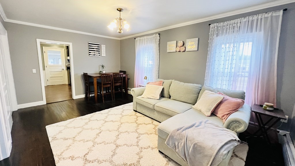 94 Witheridge Street Feeding Hills, MA 01030 - Photo 17 of 24 a bedroom with a bed and wooden floor