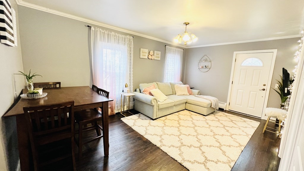 94 Witheridge Street Feeding Hills, MA 01030 - Photo 18 of 24 a bedroom with a bed and wooden floor