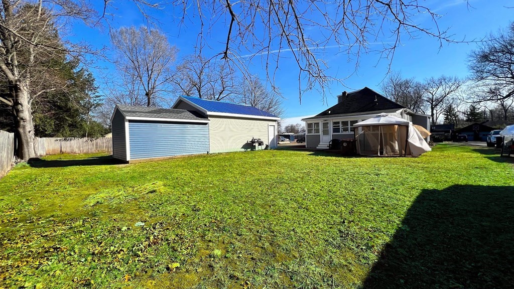 94 Witheridge Street Feeding Hills, MA 01030 - Photo 3 of 24 a view of a house with a yard