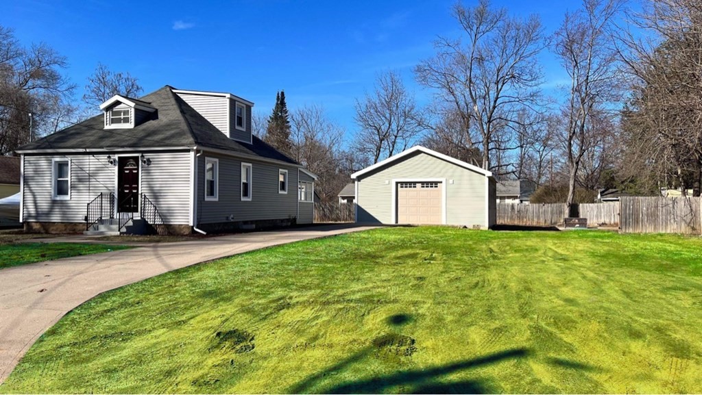 94 Witheridge Street Feeding Hills, MA 01030 - Photo 4 of 24 a view of a house with yard and a tree