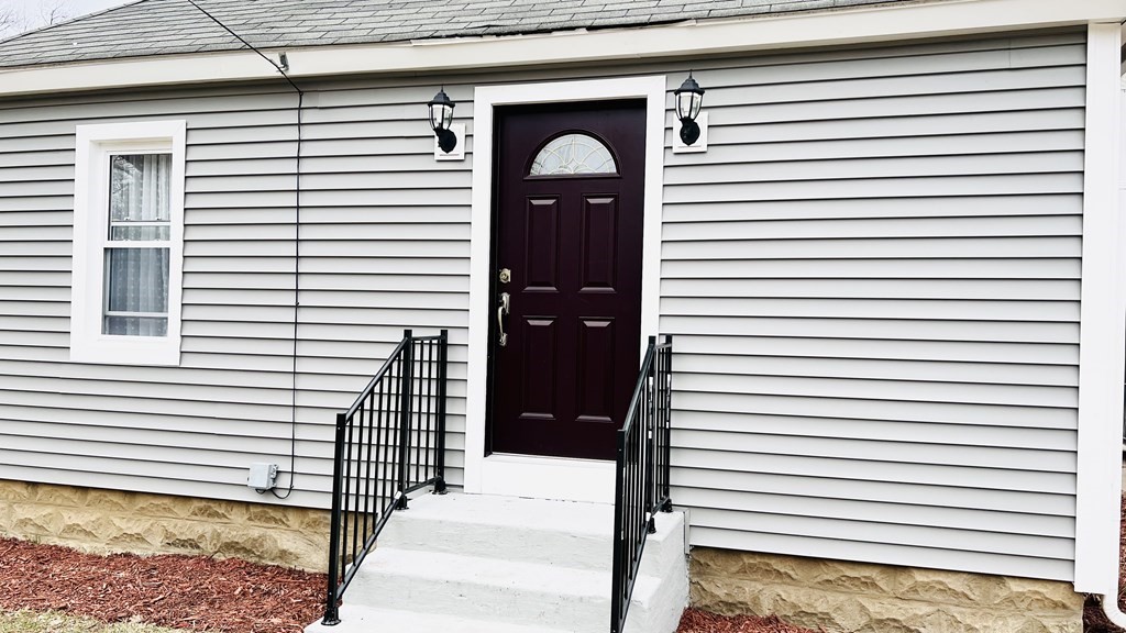 94 Witheridge Street Feeding Hills, MA 01030 - Photo 5 of 24 a view of a front of a house with a large windows
