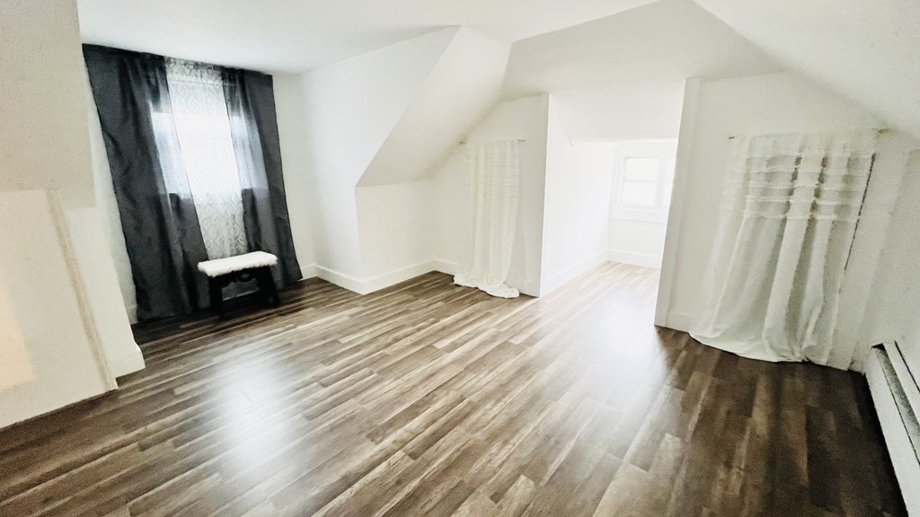 94 Witheridge Street Feeding Hills, MA 01030 - Photo 6 of 24 a view of a room with wooden floor and stairs