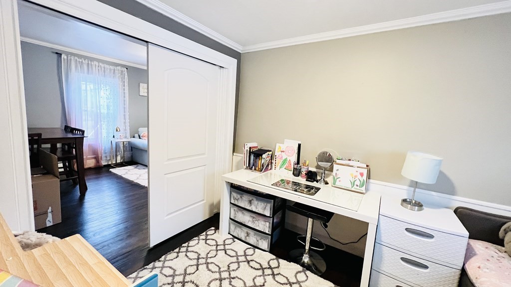 94 Witheridge Street Feeding Hills, MA 01030 - Photo 9 of 24 a view of a workspace with furniture and wooden floor
