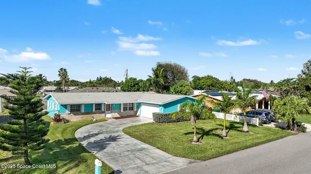 a house view with a garden space