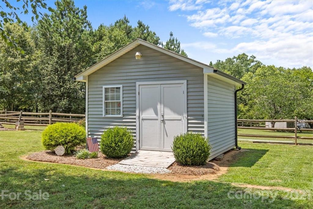 5309 Randolph Road Kannapolis, NC 28081 - Photo 40 of 41 a front view of a house with garden